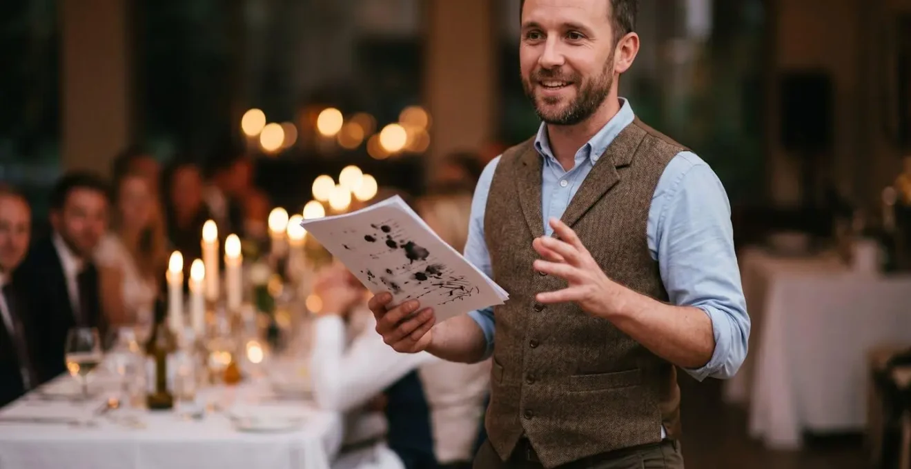 Host confidently reading from an annotated script during Burns Supper
